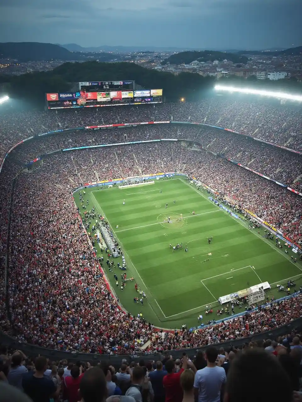 Aerial Perspective of a Bustling Football Stadium During Game